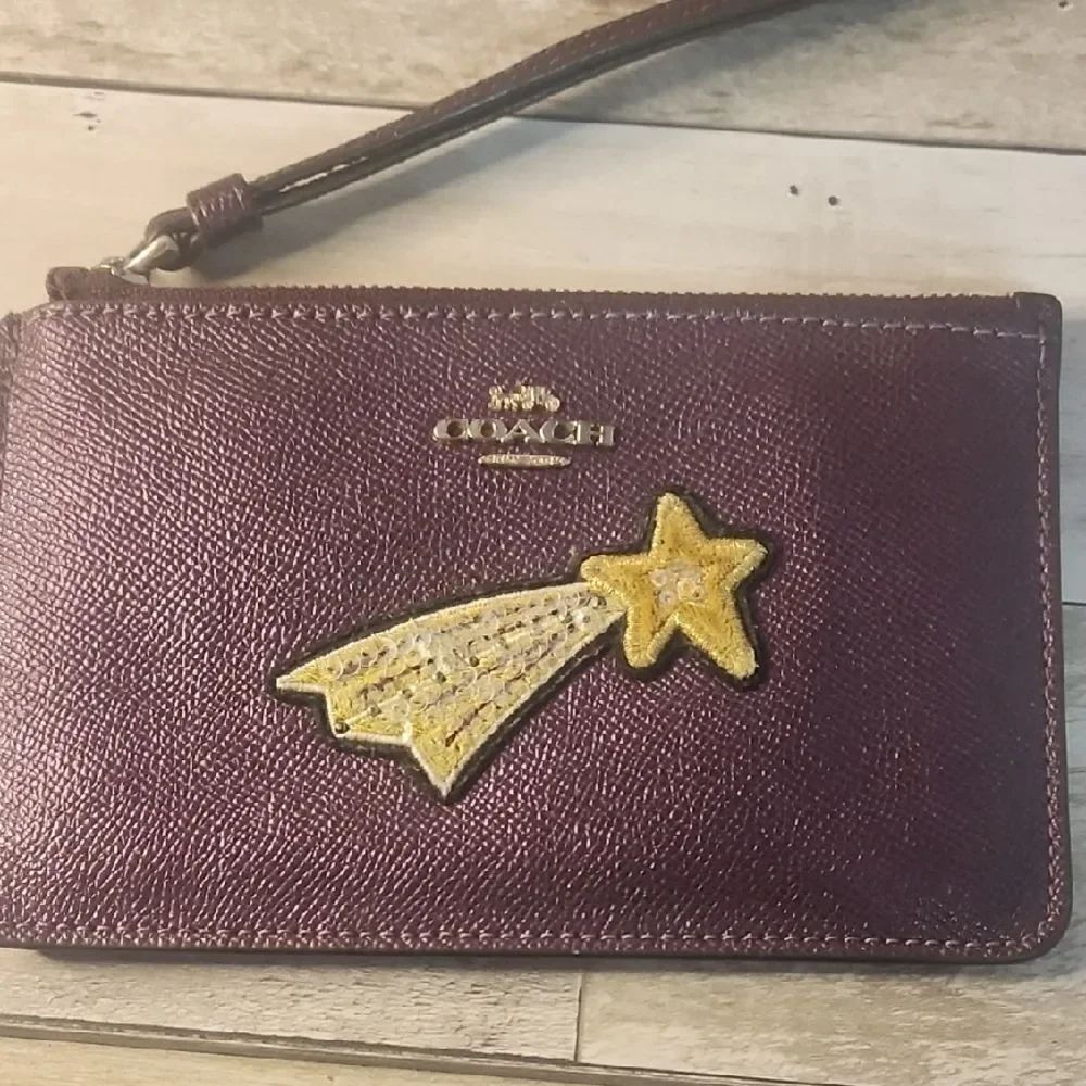 Coach Purple Wristlet with Gold Shooting Star